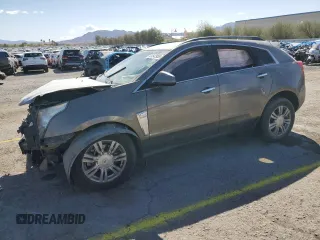 2014 Cadillac SRX z VIN 3GYFNAE37ES609830, wystawiony jako Copart lot #51542955 z przebiegiem 122 560 mil mil oraz Szkody całkowita. Historia ofert i sprzedaży dostępna na DreamBid. Obrazek 1.