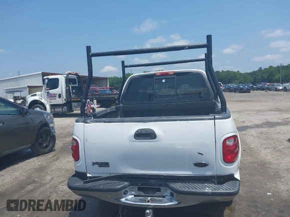 2001 Ford F-150 XLT with VIN 1FTRW07L91KB77612, listed as a IAAI auction lot 42432387 with 106,574 mi miles and . Bid and sale history available at DreamBid. Image 16.
