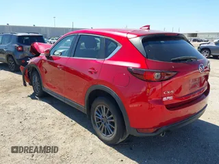 2020 Mazda CX-5 Touring with VIN JM3KFACM1L0756864, listed as a IAAI auction lot 41761131 with 16,646 mi miles and . Bid and sale history available at carsss.com. Image 3.
