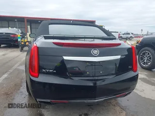 2013 Cadillac XTS Platinum z VIN 2G61V5S37D9194227, wystawiony jako IAAI lot #41510449 z przebiegiem 114 243 mil mil oraz . Historia ofert i sprzedaży dostępna na DreamBid. Obrazek 16.