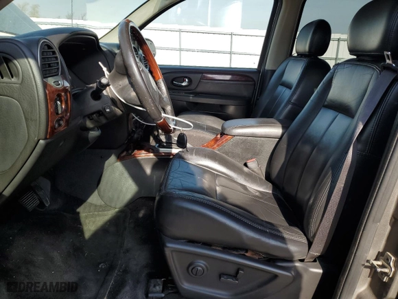 2005 GMC Envoy Denali with VIN 1GKET63M652379567, listed as a Copart auction lot 77862334 with 246,345 mi miles and Non Repairable. Bid and sale history available at carsss.com. Image 7.