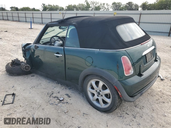 2007 MINI Convertible with VIN WMWRF33567TF66784, listed as a Copart auction lot 71571744 with 115,008 mi miles and Salvage Title. Bid and sale history available at DreamBid. Image 2.