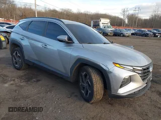 2022 Hyundai Tucson SEL with VIN 5NMJFCAE4NH060031, listed as a IAAI auction lot 41451874 with 57,228 mi miles and . Bid and sale history available at carsss.com. Image 1.