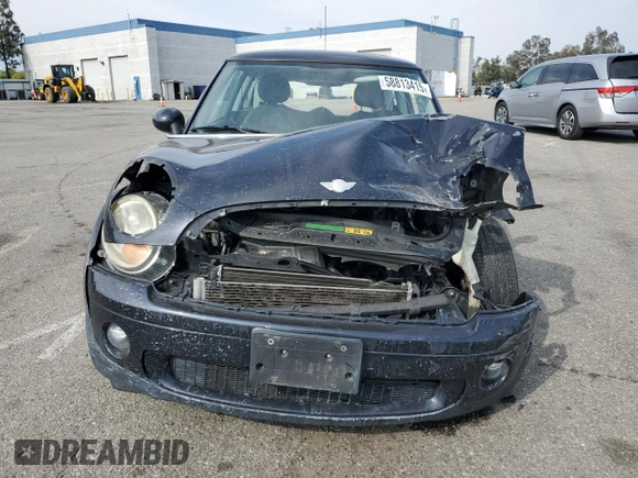 2007 MINI Hardtop z VIN WMWMF33537TT54433, wystawiony jako Copart lot #58813415 z przebiegiem 111 250 mil mil oraz Szkoda całkowita • Salvage title. Historia ofert i sprzedaży dostępna na DreamBid. Obrazek 5.