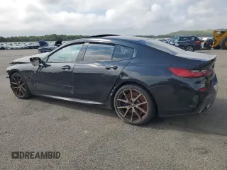 2020 BMW 8 Series M850i with VIN WBAGV8C07LBP48826, listed as a Copart auction lot 65445504 with 32,147 mi miles and Salvage title. Bid and sale history available at DreamBid. Image 2.