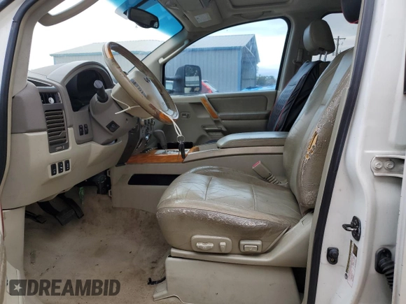 2005 Infiniti QX56 with VIN 5N3AA08C15N801291, listed as a Copart auction lot 42801095 with 730,377 mi miles and Salvage Title. Bid and sale history available at carsss.com. Image 7.