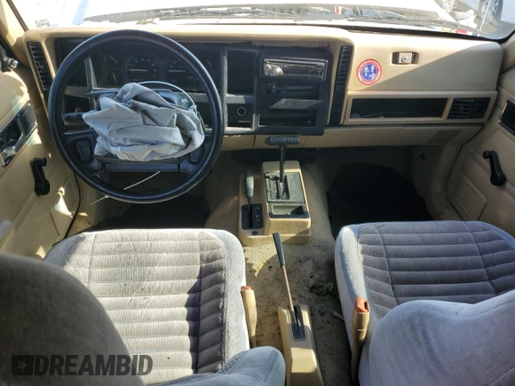1996 Jeep Cherokee SE z VIN 1J4FJ28S7TL270218, wystawiony jako Copart lot #55302885 z przebiegiem 239 209 mil mil oraz Szkoda całkowita • Salvage title. Historia ofert i sprzedaży dostępna na DreamBid. Obrazek 8.