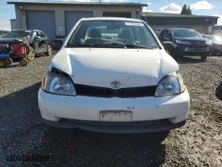 2002 Toyota ECHO with VIN JTDBT123020215409, listed as a Copart auction lot 71653384 with 265,969 mi miles and Salvage Title. Bid and sale history available at carsss.com. Image 5.
