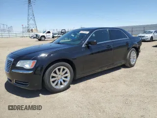 2014 Chrysler 300 with VIN 2C3CCAAG8EH307087, listed as a Copart auction lot 54091345 with 217,869 mi miles and Salvage Title. Bid and sale history available at DreamBid. Image 1.