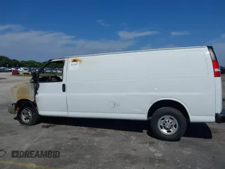 2021 Chevrolet Express Cargo with VIN 1GCWGBFP1M1267945, listed as a IAAI auction lot 38745449 with Not provided miles and . Bid and sale history available at DreamBid. Image 13.