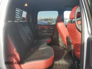 2016 Ram 1500 Rebel z VIN 1C6RR7YT3GS385998, wystawiony jako Copart lot #88633265 z przebiegiem 133 802 mil mil oraz Szkody całkowita. Historia ofert i sprzedaży dostępna na DreamBid. Obrazek 10.