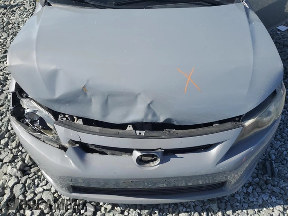 2012 Scion tC z VIN JTKJF5C78C3040542, wystawiony jako Copart lot #43595925 z przebiegiem 160 106 mil mil oraz Szkoda całkowita • Salvage title. Historia ofert i sprzedaży dostępna na DreamBid. Obrazek 13.