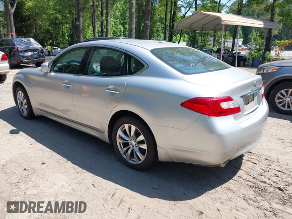 2012 Infiniti M with VIN JN1BY1AR4CM396809, listed as a IAAI auction lot 42394230 with 227,846 mi miles and . Bid and sale history available at DreamBid. Image 3.