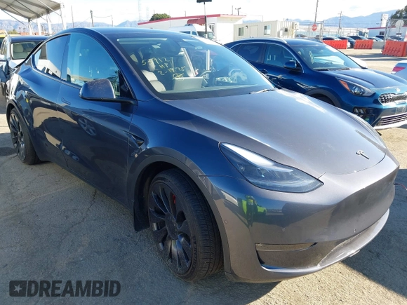 2022 Tesla Model Y Performance with VIN 7SAYGDEF7NF562895, listed as a IAAI auction lot 41692864 with 29,904 mi miles and . Bid and sale history available at DreamBid. Image 1.