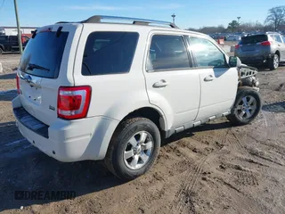 2011 Ford Escape Limited with VIN 1FMCU9EG5BKC09796, listed as a IAAI auction lot 41792944 with 134,117 mi miles. Bid and sale history available at carsss.com. Image 4.