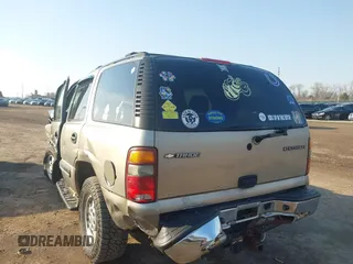 2003 Chevrolet Tahoe LS with VIN 1GNEK13V03J154985, listed as a IAAI auction lot 41708954 with 203,826 mi miles and . Bid and sale history available at DreamBid. Image 3.