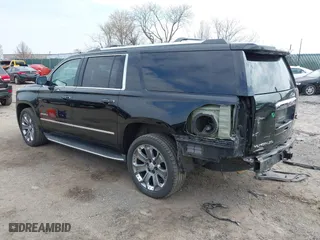 2016 GMC Yukon XL Denali with VIN 1GKS2HKJ8GR139858, listed as a IAAI auction lot 41915183 with 151,830 mi miles. Bid and sale history available at carsss.com. Image 3.