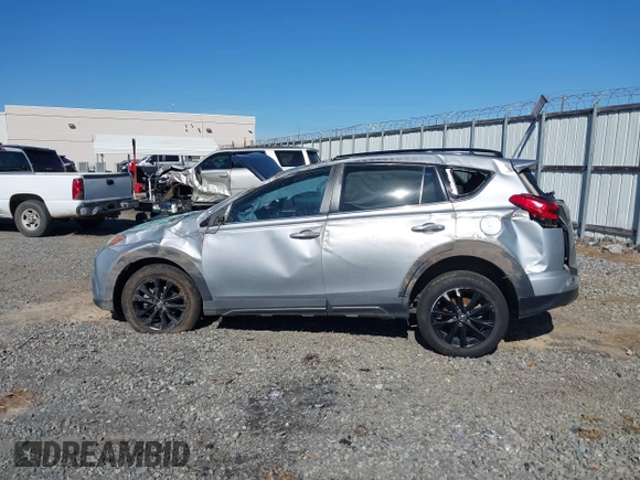 2018 Toyota RAV4 XLE with VIN 2T3RFREVXJW748993, listed as a IAAI auction lot 41878888 with 111,760 mi miles and . Bid and sale history available at DreamBid. Image 14.