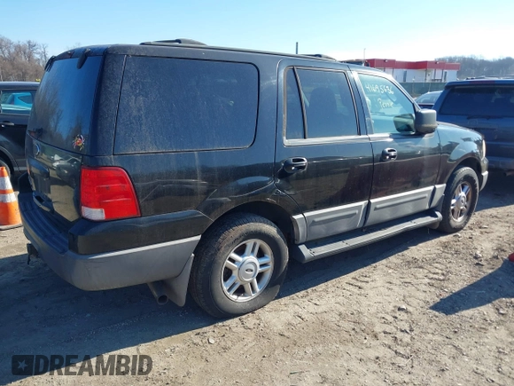 2004 Ford Expedition XLT with VIN 1FMPU16WX4LB12891, listed as a IAAI auction lot 41695636 with 209,574 mi miles. Bid and sale history available at carsss.com. Image 4.