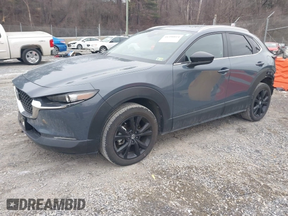 2023 Mazda CX-30 2.5 S Carbon Edition with VIN 3MVDMBCM8PM584296, listed as a IAAI auction lot 41390814 with 19,959 mi miles. Bid and sale history available at carsss.com. Image 2.