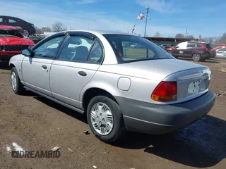 1999 Saturn SL z VIN 1G8ZH5281XZ376254, wystawiony jako IAAI lot #41857372 z przebiegiem 229 836 mil mil oraz . Historia ofert i sprzedaży dostępna na DreamBid. Obrazek 3.