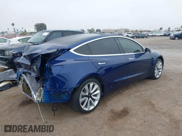 2020 Tesla Model 3 Standard Range Plus with VIN 5YJ3E1EA1LF802648, listed as a IAAI auction lot 42208034 with 27,231 mi miles and . Bid and sale history available at DreamBid. Image 4.