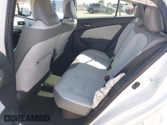 2021 Toyota Prius LE with VIN JTDKAMFP2M3177459, listed as a IAAI auction lot 42093828 with 65,501 mi miles and . Bid and sale history available at DreamBid. Image 8.