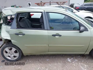 2007 Ford Focus S z VIN 1FAHP37N47W278284, wystawiony jako IAAI lot #42246383 z przebiegiem 164 830 mil mil oraz . Historia ofert i sprzedaży dostępna na DreamBid. Obrazek 14.