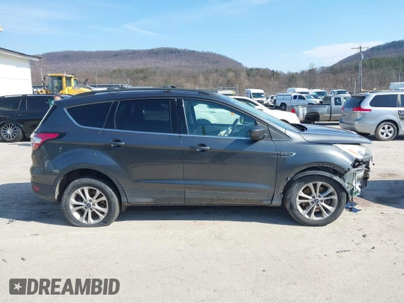 2017 Ford Escape SE with VIN 1FMCU9G99HUD03370, listed as a IAAI auction lot 41700809 with 136,575 mi miles. Bid and sale history available at carsss.com. Image 14.