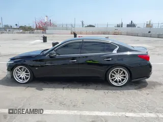 2014 Infiniti Q50 Premium z VIN JN1BV7AP3EM690571, wystawiony jako IAAI lot #42136354 z przebiegiem 191 969 mil mil oraz . Historia ofert i sprzedaży dostępna na DreamBid. Obrazek 14.