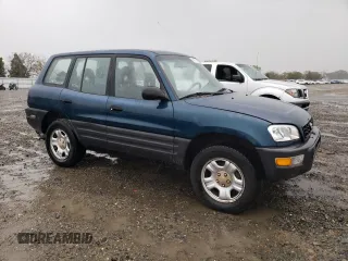1999 Toyota RAV4 with VIN JT3GP10V6X0036057, listed as a Copart auction lot 49011295 with 183,287 mi miles and Clean title. Bid and sale history available at DreamBid. Image 4.