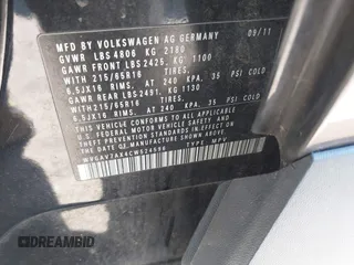2012 Volkswagen Tiguan SEL with VIN WVGAV7AX4CW524596, listed as a IAAI auction lot 42042966 with 100,986 mi miles and . Bid and sale history available at DreamBid. Image 9.