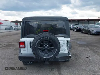 2022 Jeep Wrangler Sport S z VIN 1C4GJXAN9NW124190, wystawiony jako IAAI lot #42027247 z przebiegiem 8 376 mil mil oraz . Historia ofert i sprzedaży dostępna na DreamBid. Obrazek 16.