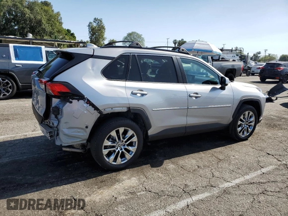 2021 Toyota RAV4 XLE Premium with VIN 2T3C1RFV4MC148429, listed as a Copart auction lot 58264395 with 26,799 mi miles and Salvage title. Bid and sale history available at DreamBid. Image 3.
