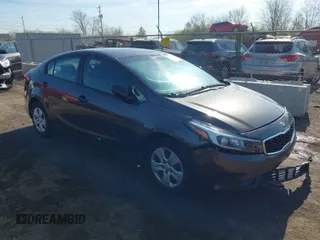 2017 Kia Forte LX with VIN 3KPFK4A7XHE156816, listed as a IAAI auction lot 41974501 with 153,606 mi miles. Bid and sale history available at carsss.com. Image 1.