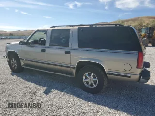 1999 Chevrolet Suburban with VIN 1GNFK16R6XJ492206, listed as a Copart auction lot 71728594 with 129,871 mi miles and Salvage Title. Bid and sale history available at carsss.com. Image 2.