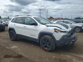 2016 Jeep Cherokee Trailhawk with VIN 1C4PJMBS8GW359461, listed as a Copart auction lot 57950705 with 146,124 mi miles and Salvage title. Bid and sale history available at DreamBid. Image 4.