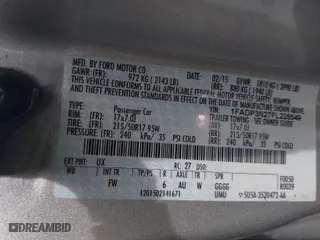 2015 Ford Focus Titanium with VIN 1FADP3N27FL228549, listed as a IAAI auction lot 41912941 with 69,025 mi miles. Bid and sale history available at carsss.com. Image 9.