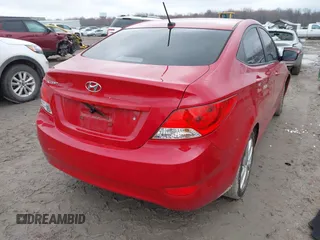 2013 Hyundai Accent GLS with VIN KMHCU4AE7DU461600, listed as a IAAI auction lot 42019159 with 53,452 mi miles. Bid and sale history available at carsss.com. Image 4.