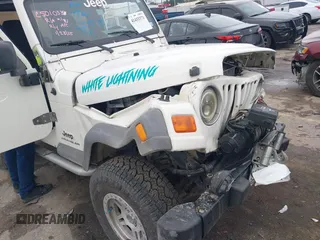 2005 Jeep Wrangler Sport with VIN 1J4FA49S25P320240, listed as a IAAI auction lot 41433371 with 144,552 mi miles. Bid and sale history available at carsss.com. Image 6.