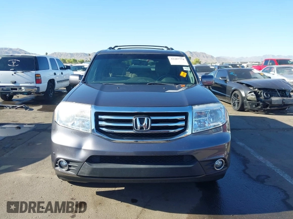 2014 Honda Pilot Touring z VIN 5FNYF4H90EB033259, wystawiony jako IAAI lot #42287774 z przebiegiem 115 416 mil mil oraz . Historia ofert i sprzedaży dostępna na DreamBid. Obrazek 12.