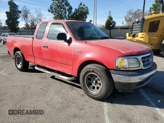 2000 Ford F-150 XL with VIN 1FTZX1721YNA67771, listed as a Copart auction lot 41439795 with 0 mi miles and Salvage Title. Bid and sale history available at carsss.com. Image 4.