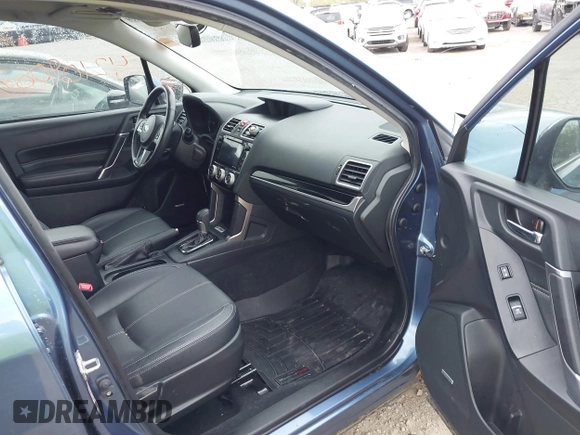 2017 Subaru Forester Touring with VIN JF2SJAWC4HH803275, listed as a IAAI auction lot 42109087 with 114,532 mi miles and . Bid and sale history available at DreamBid. Image 5.