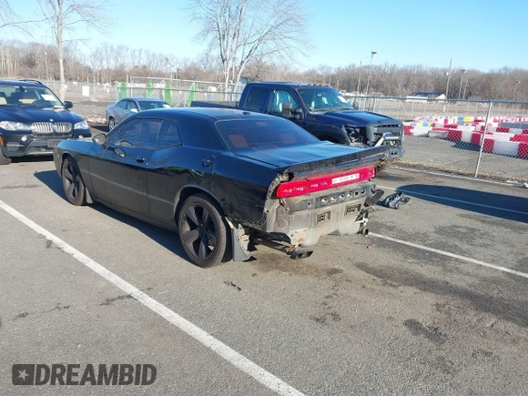 2013 Dodge Challenger R/T with VIN 2C3CDYBT6DH614418, listed as a IAAI auction lot 41583274 with 63,409 mi miles. Bid and sale history available at carsss.com. Image 3.