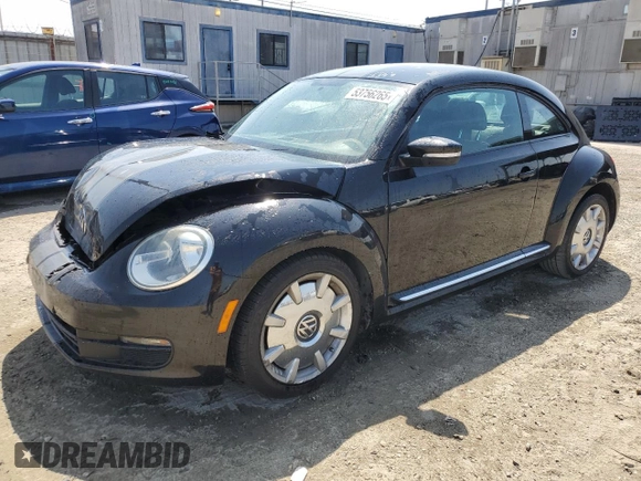 2012 Volkswagen Beetle 2.5L w/Sound/Nav PZEV with VIN 3VWJP7AT7CM646779, listed as a Copart auction lot 53756265 with 116,662 mi miles and Salvage Title. Bid and sale history available at DreamBid. Image 1.