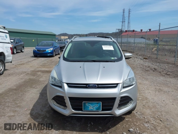 2016 Ford Escape Titanium with VIN 1FMCU9JX3GUA62802, listed as a IAAI auction lot 42001690 with 124,452 mi miles. Bid and sale history available at carsss.com. Image 12.