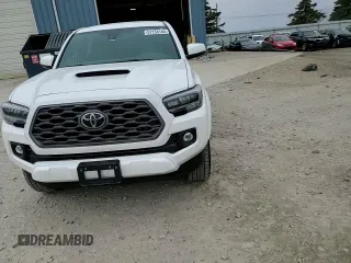 2023 Toyota Tacoma SR z VIN 3TMCZ5AN0PM651386, wystawiony jako Copart lot #51158185 z przebiegiem 23 642 mil mil oraz Szkoda całkowita • Salvage title. Historia ofert i sprzedaży dostępna na DreamBid. Obrazek 11.