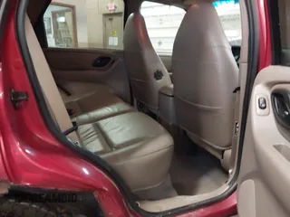 2001 Ford Escape XLT with VIN 1FMYU04101KF46809, listed as a IAAI auction lot 41664202 with 256,468 mi miles. Bid and sale history available at carsss.com. Image 8.