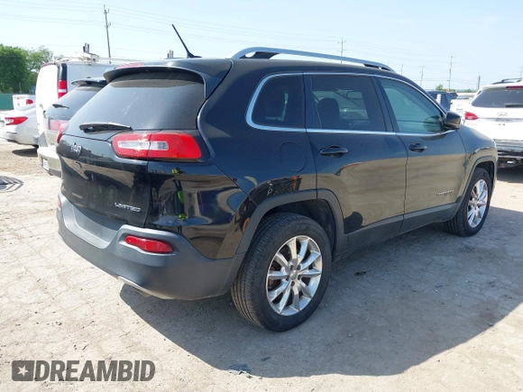 2014 Jeep Cherokee Limited with VIN 1C4PJMDS5EW242544, listed as a IAAI auction lot 42213907 with 114,515 mi miles and . Bid and sale history available at DreamBid. Image 4.