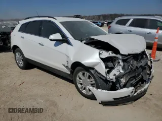 2014 Cadillac SRX with VIN 3GYFNAE32ES667019, listed as a Copart auction lot 49008165 with 98,995 mi miles and Salvage Title. Bid and sale history available at DreamBid. Image 4.